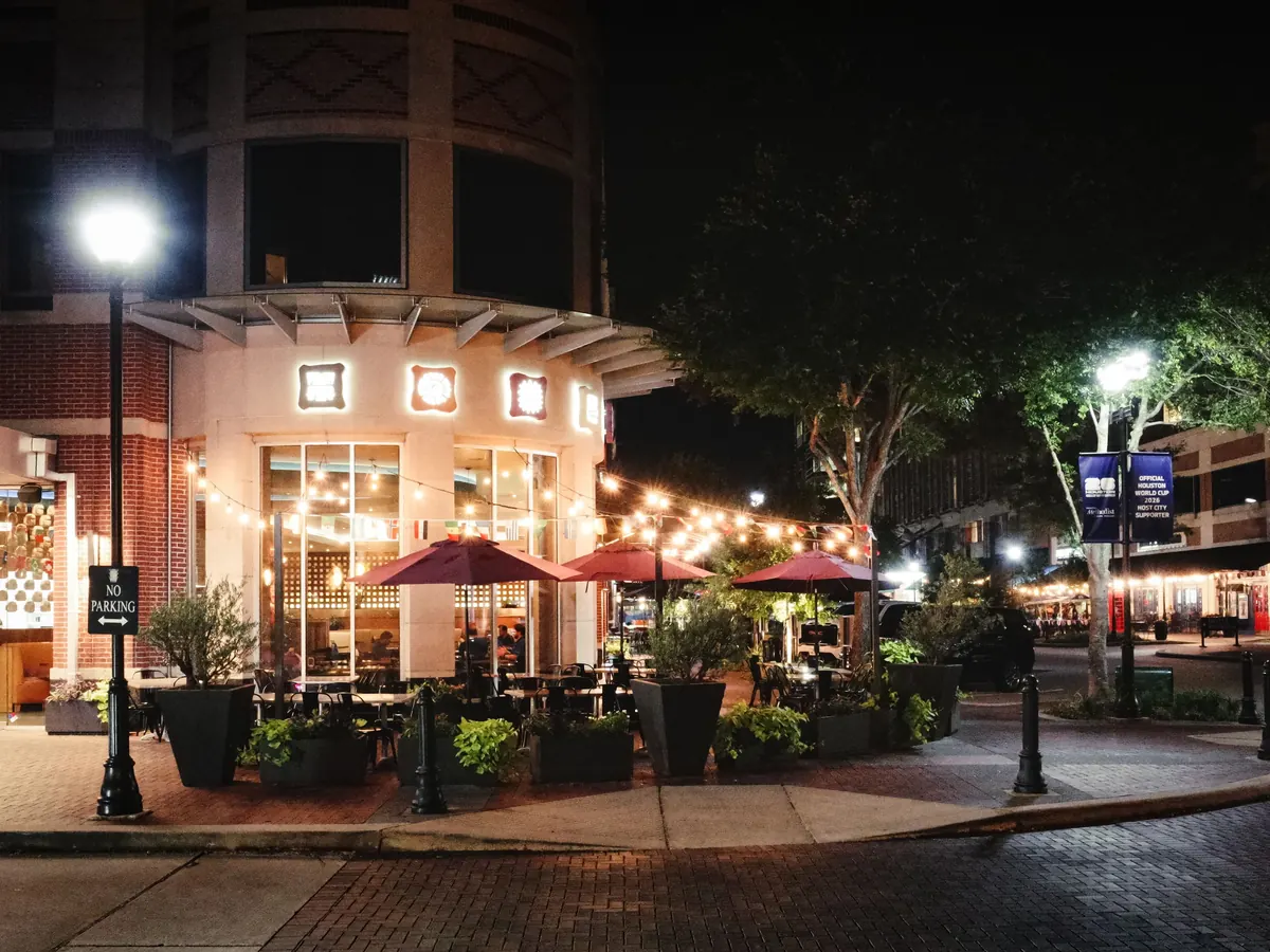 Outdoor dining at night in Sugar Land, Texas